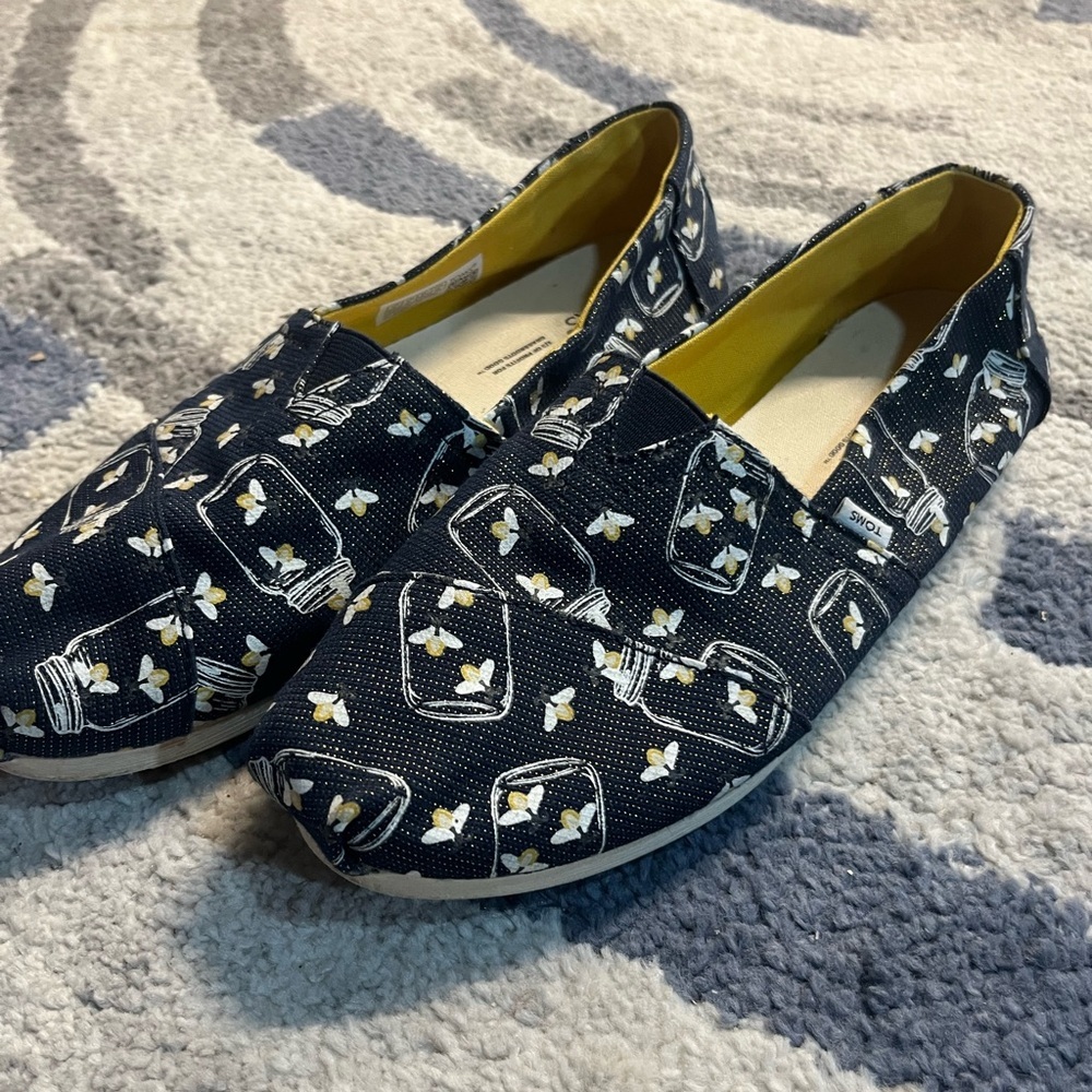 Toms Black and Yellow Bee Print Slip-Ons